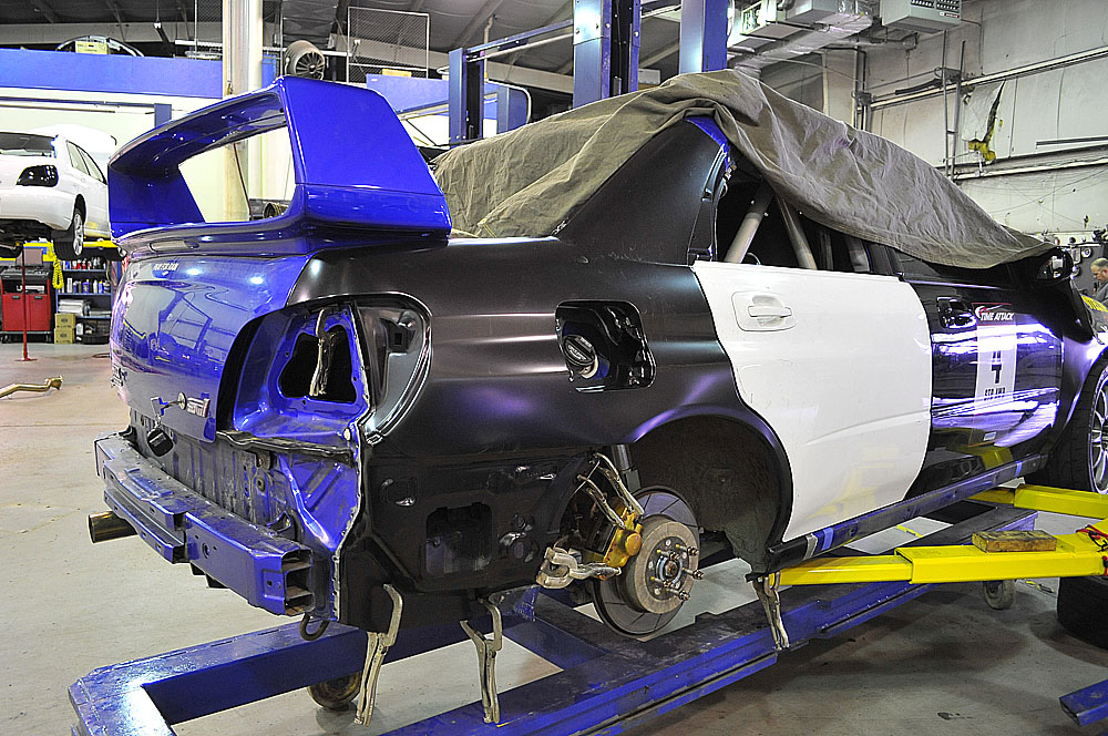 Vehicle on a frame rack at IAG Collision